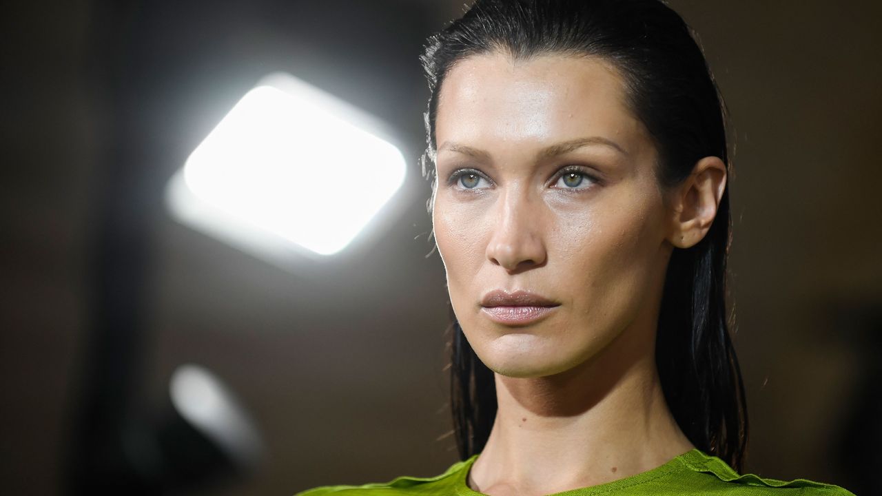 Close-up of Bella Hadid as she walks the runway.