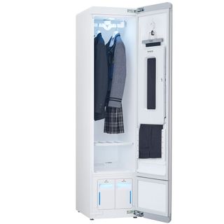 white wardrobe with door hanger and clothes