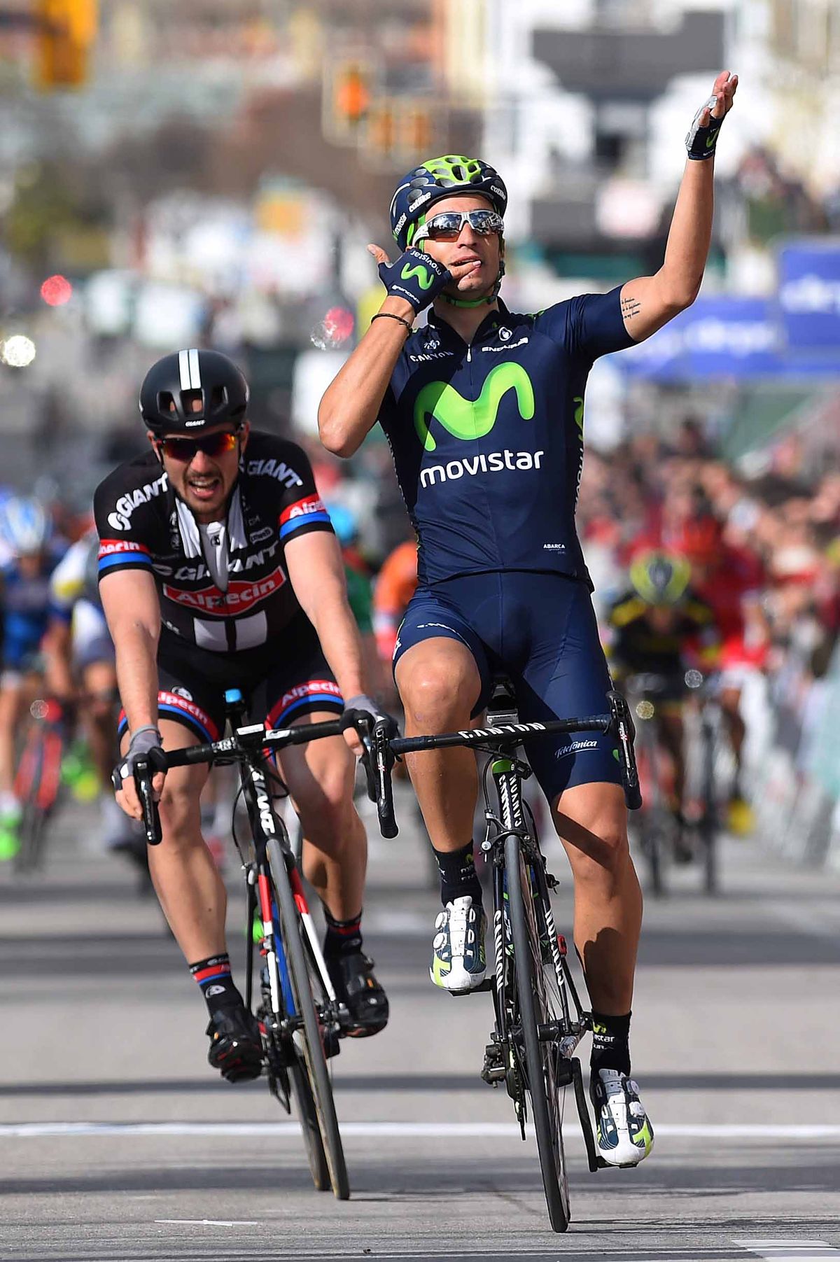 Juan Jose Lobato (Movistar) phones home to tell them he won