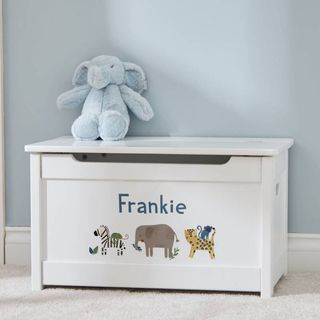 Personalised toyboxes illustrated by white toyboxes with name son