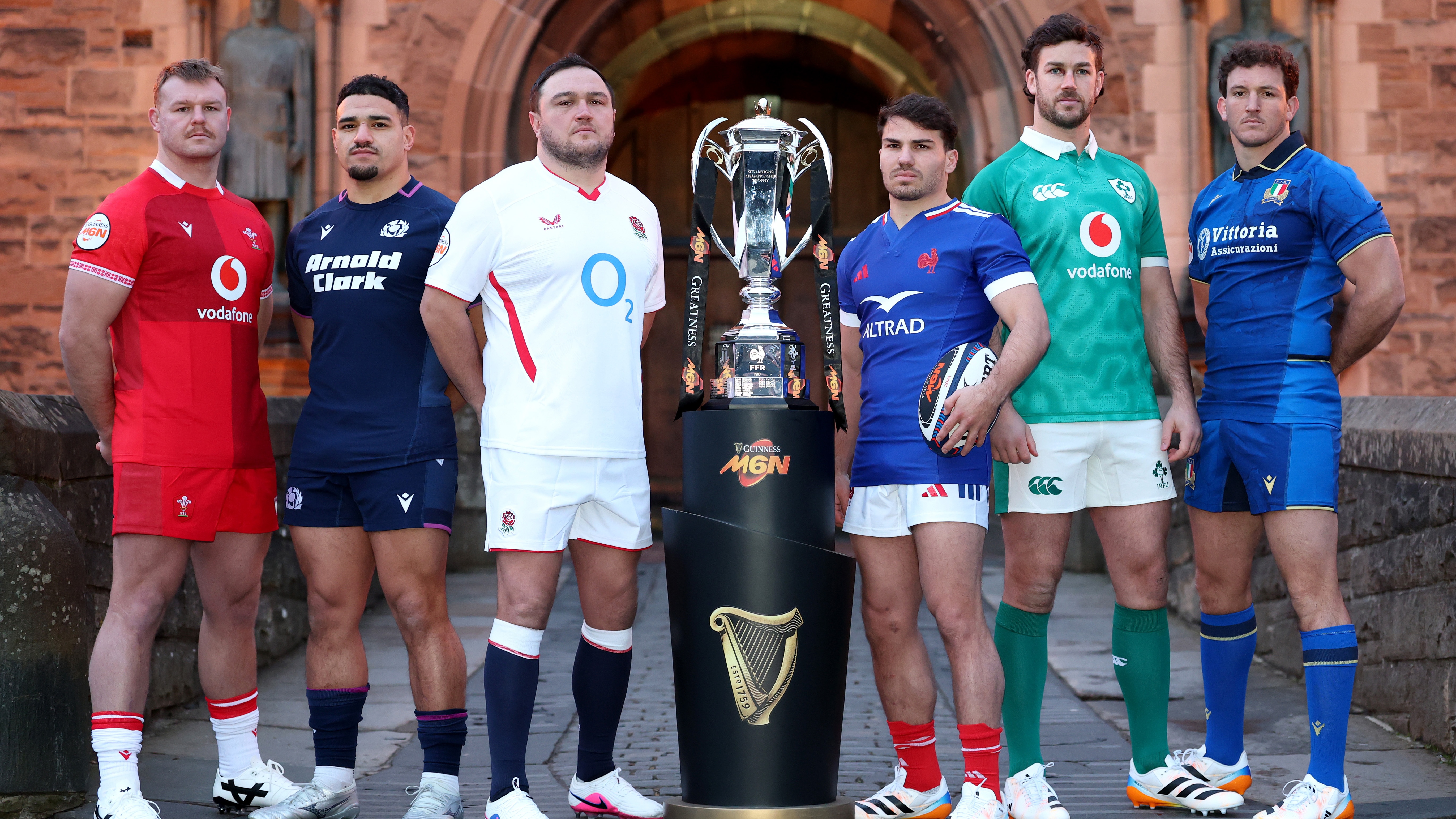 Dewi Lake of Wales, Sione Tuipulotu of Scotland, Jamie George of England, Antoine Dupont of France, Caelan Doris of Ireland and Michele Lamaro of Italy pose for a photo with the Guinness Six Nations trophy during the 2026 Guinness Men's Six Nations Launch Event on January 26, 2026 in Edinburgh, Scotland.