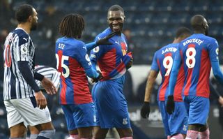 Crystal Palace's Christian Benteke (centre) celebrates with team-mate Eberechi Eze scoring his side's fifth goal of the game during the Premier League match at The Hawthorns, West Bromwich.