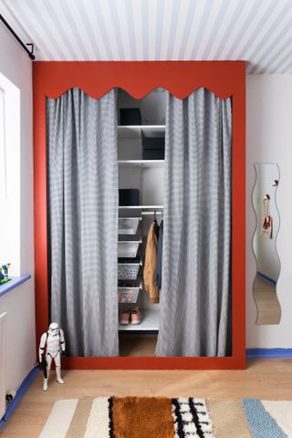 Playful printed closet with curtains