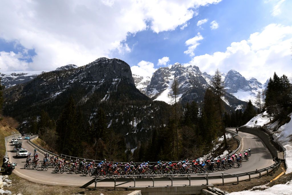 PIEVEDIBONO ITALY APRIL 22 The peloton passing through Folgarida 1351m landscape during the 44th Tour of the Alps 2021 Stage 4 a 1686 to stage from Naturns to Valle del Chiese Pieve di Bono TourofTheAlps Mountains Snow Forest TouroftheAlps on April 22 2021 in Pieve di Bono Italy Photo by Tim de WaeleGetty Images