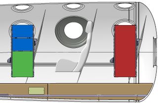 A sideview of SpaceShipTwo's cabin show payload racks, mid-deck locker equivalents holding experiments, and a seat for the flight test engineer