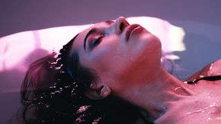 woman relaxed in a dry flotation tank