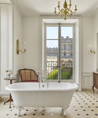 Palace of Versailles interiors, rattan furniture in bathroom with freestanding tub