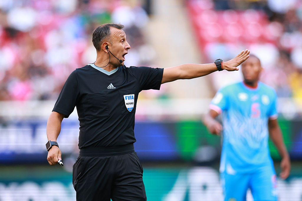 ZAPOPAN, MEXICO - MARCH 31: Referee Dar&amp;iacute;o Herrera gestures after replacing referee Facundo Tello (not in frame) during the FIFA World Cup 2026 Play-Off tournament final match between Congo DR and Jamaica at Estadio Guadalajara on March 31, 2026 in Zapopan, Mexico. (Photo by Manuel Velasquez - FIFA/FIFA via Getty Images)