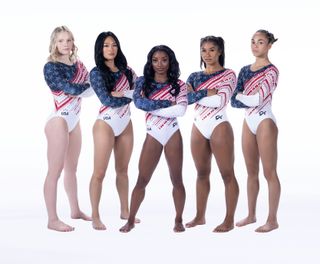 the team USA gymnasts wearing their EK athletics team uniform