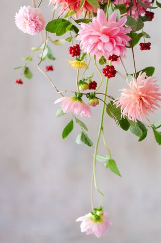 Hanging flower decor with dahlias and honeysuckle
