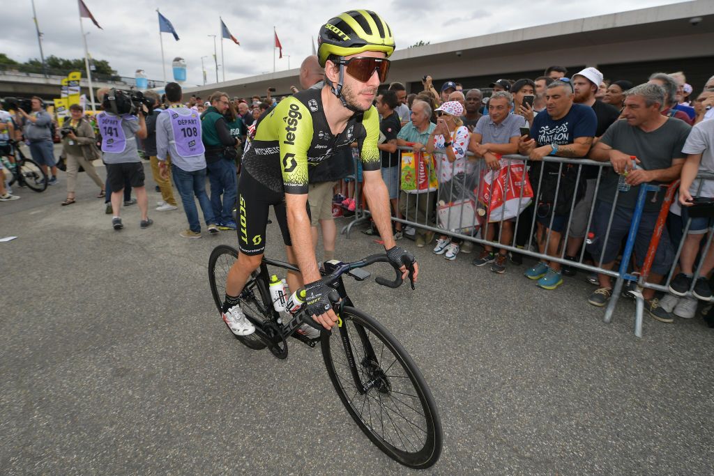 Adam Yates rides to the start of stage 12 of the Tour de France