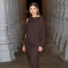 Sofia Richie Grainge wears a chocolate brown dress.