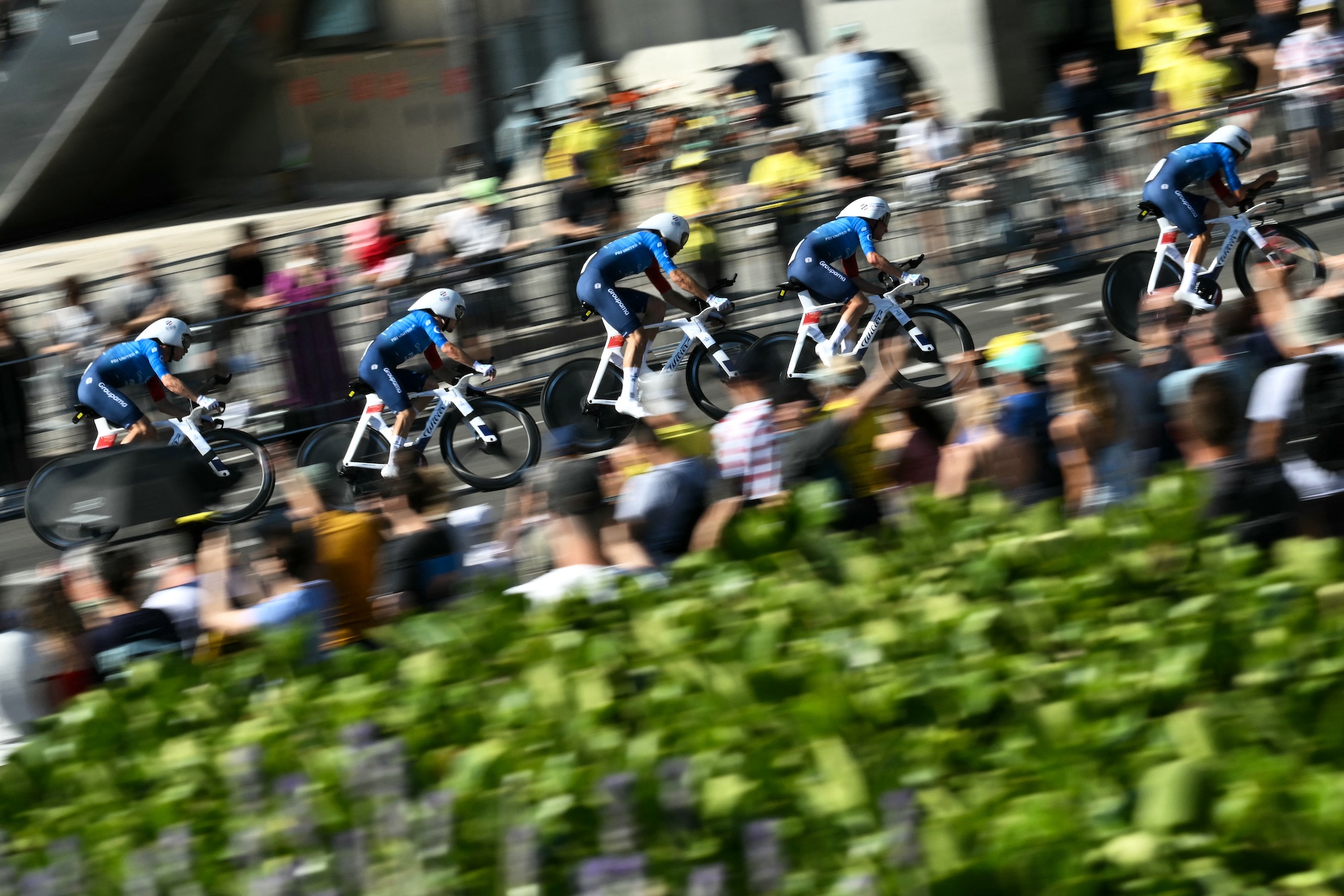 Groupama-FDJ United cycles during the 1st stage of the 113th edition of the Tour de France cycling race, a 19,6 km team time trial stage in and around Barcelona in northeastern Spain, on July 4, 2026. (Photo by Jeff PACHOUD / AFP via Getty Images)