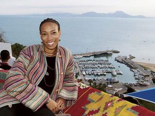 sala elise patterson on a cafe balcony in tunisia