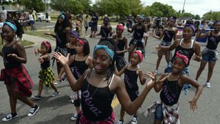 denver, co june 17 members of divaz dance group join participants in the juneteenth music festival and parade as they make their way down e 26th ave on june 17, 2017 in denver, colorado organizers say its one of denver's longest running parades dating back to the 1950's where "nearly 3,000 people march to honor the struggles and social progress achieved through marches and demonstrations organized for freedom, justice, and equality in our countrys history" this year's theme for the event is dream big photo by kathryn scottthe denver post via getty images