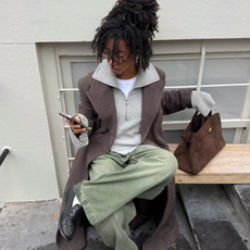 woman wearing winter outfit coat and hoodie