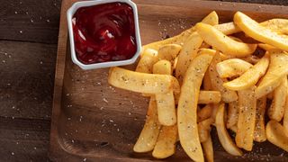 a plate of chips and sauce