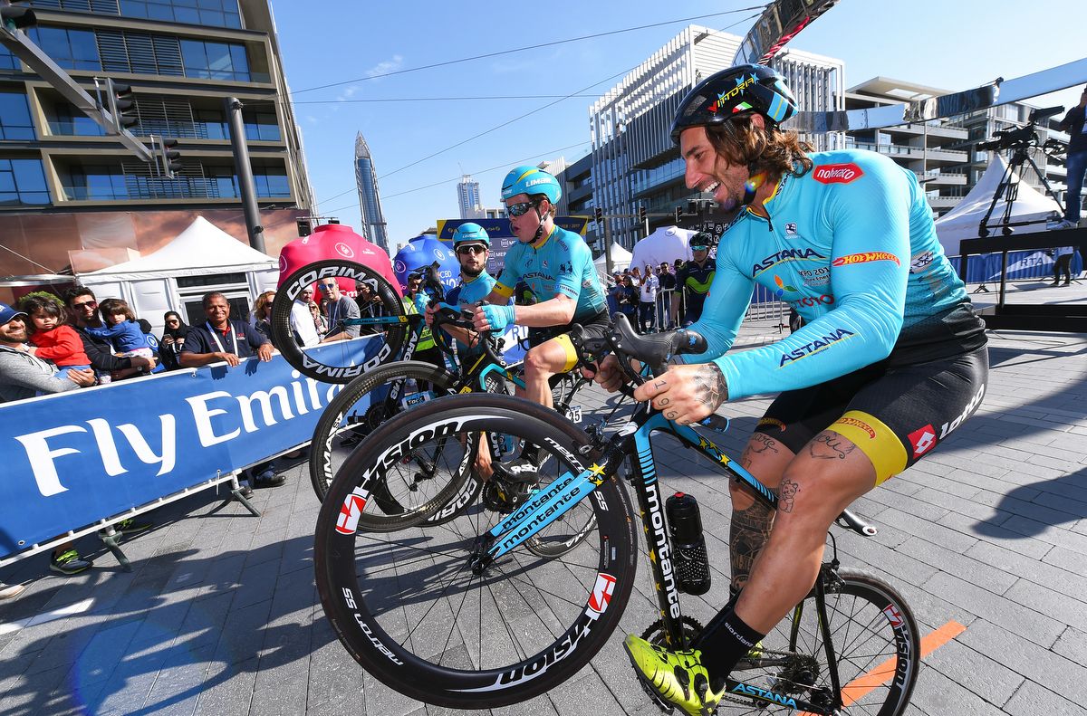 Vittorio Brumotti playing around with the Astana riders at the Dubai Tour