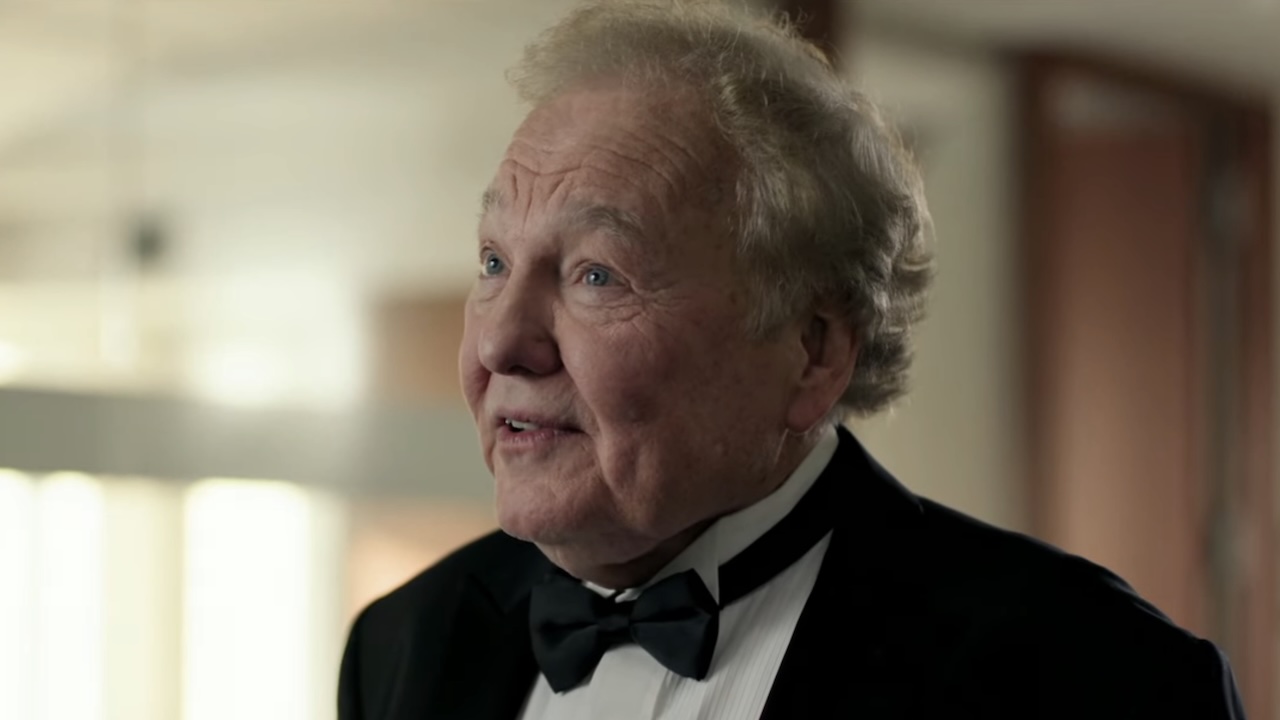 Jim Downey in tux in Oscars post-credits sequence