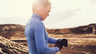 Woman wearing running gloves