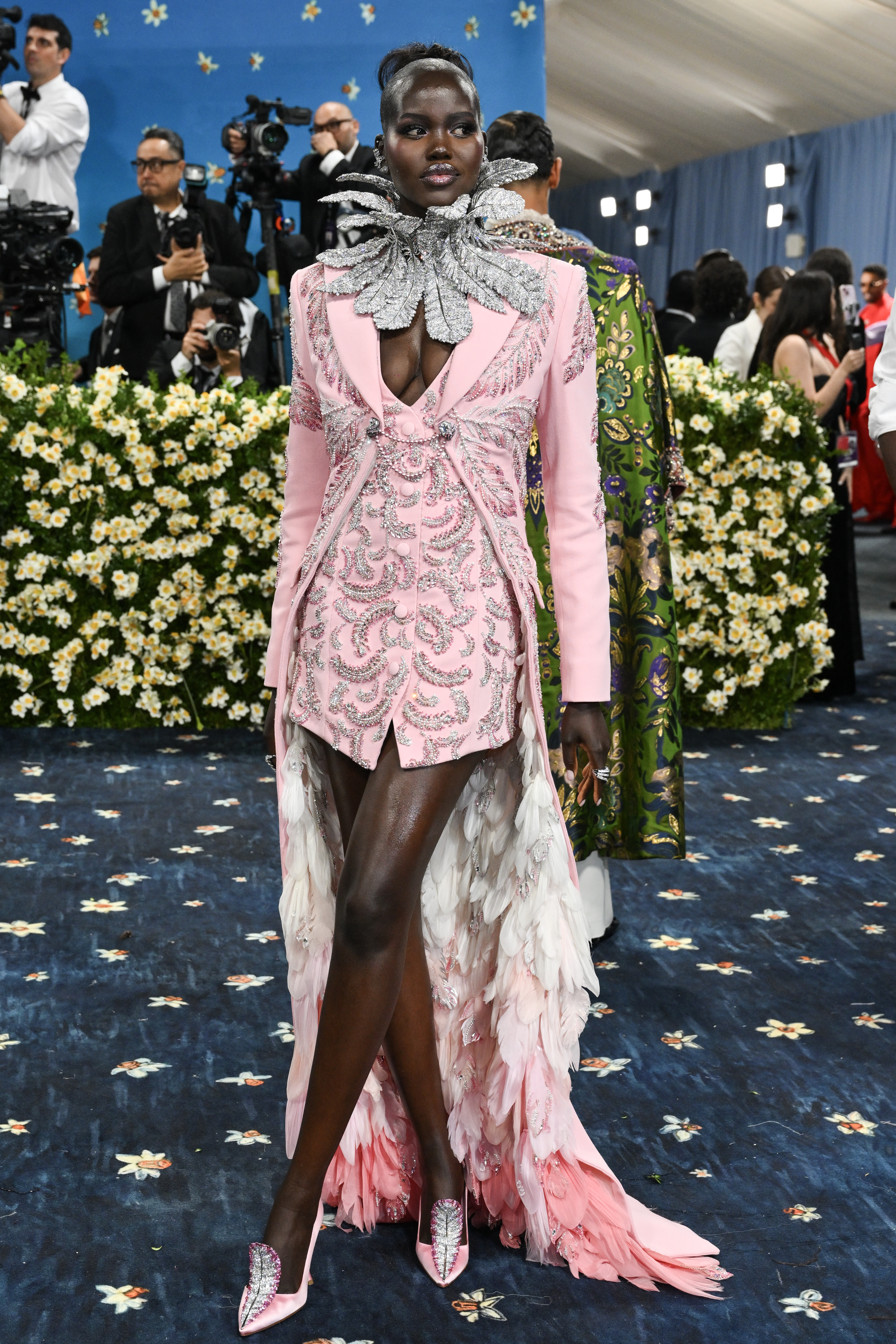 Adut Akech wears a waisted blazer to the 2025 Met Gala.