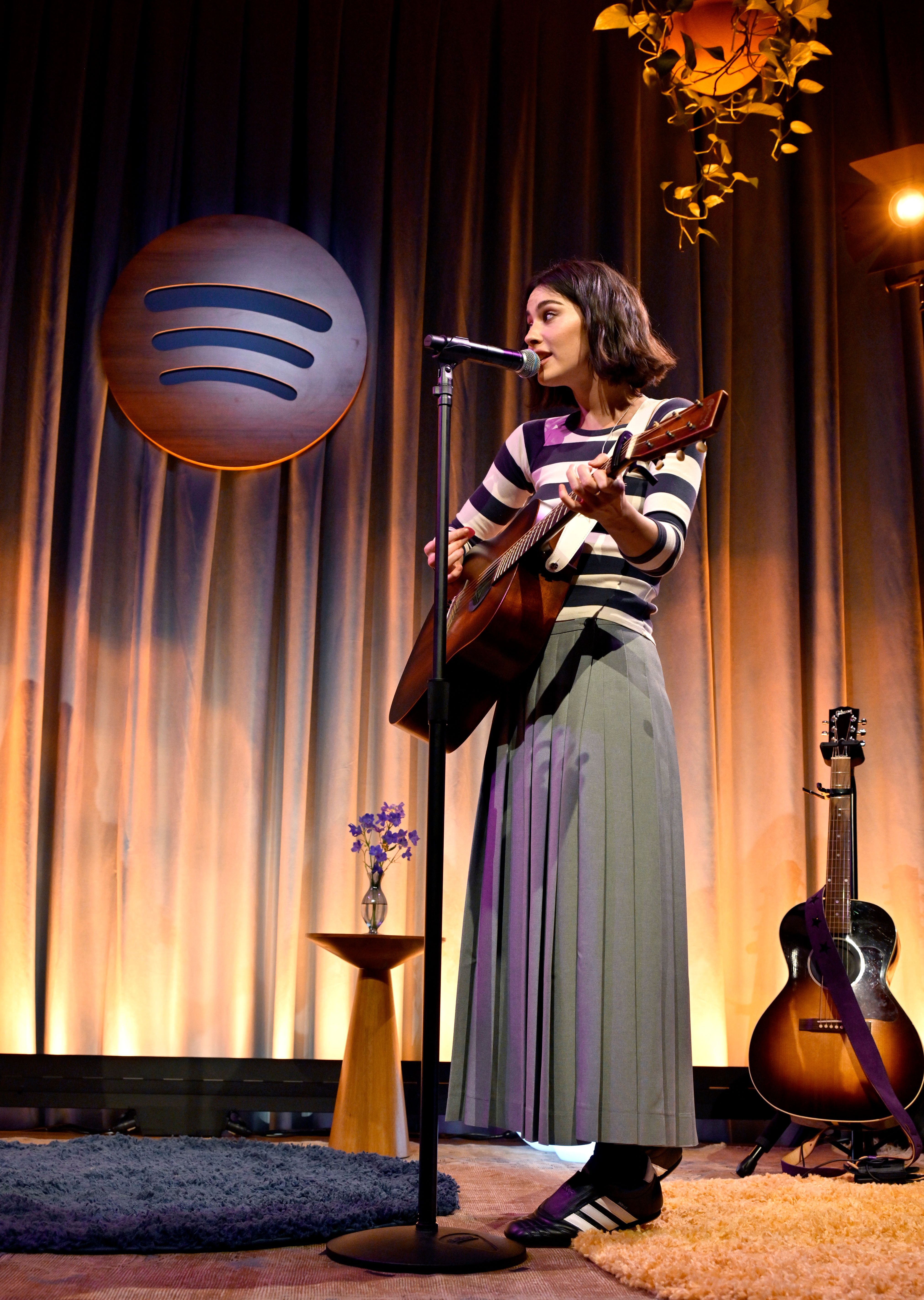 Gracie Abrams wore on-sale Adidas Taekwondo sneakers during a november 2024 performance