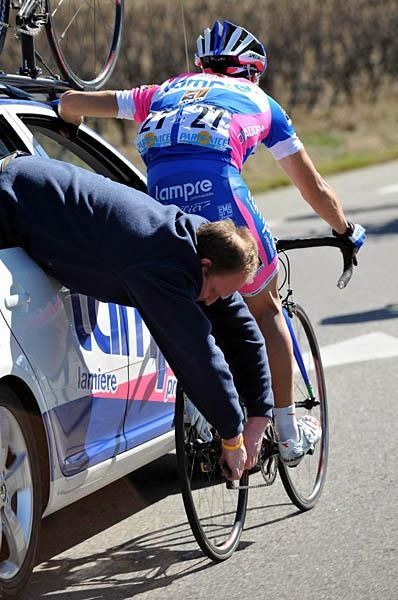 Simon Spilak (Lampre) gets a little last-minute adjustment on his bicycle.
