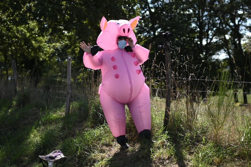 A fan waits for the riders during the 12th stage of the 107th edition of the Tour de France cycling race 218 km between Chauvigny and Sarran on September 10 2020 Photo by Marco BERTORELLO AFP Photo by MARCO BERTORELLOAFP via Getty Images