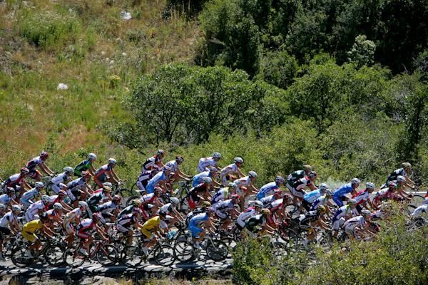 The bunch makes it to the first KOM.