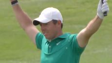 Rory McIlroy celebrates holing out for eagle at the Italian Open