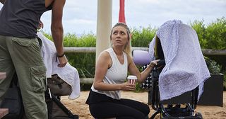Liz is annoyed at Ash (Martin Ashford) for bumping into her pram and checks to see if her baby is ok in Home and Away.