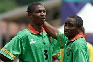 Rigobert Song is consoled by Cameroon team-mate Louis-Paul M'Fédé after his red card against Brazil at the 1994 World Cup.