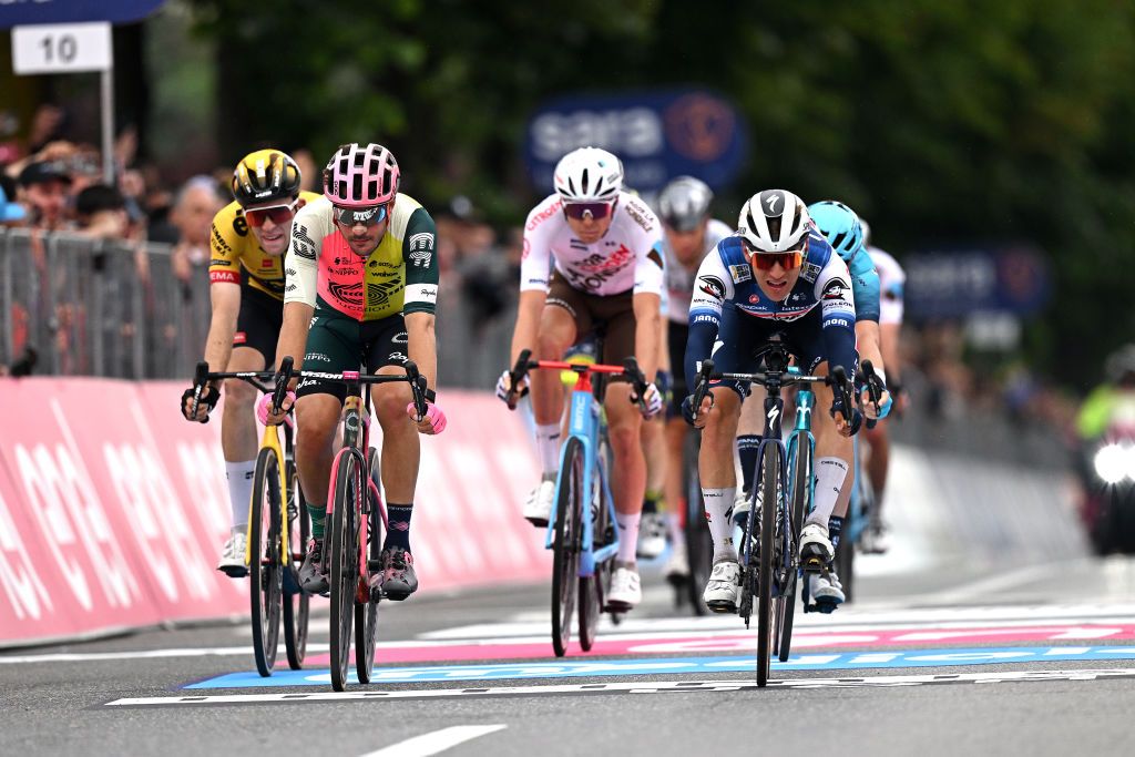 RIVOLI ITALY MAY 18 LR Michel Hessmann of Germany and Team JumboVisma Alberto Bettiol of Italy and Team EF EducationEasyPost and Ilan Van Wilder of Belgium and Team Soudal Quick Step cross the finish line during the 106th Giro dItalia 2023 Stage 12 a 185km stage from Bra to Rivoli UCIWT on May 18 2023 in Rivoli Italy Photo by Stuart FranklinGetty Images
