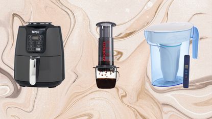 A trio of kitchen appliances on sale for Amazon Prime Day including Ninja AF101 air fryer, Aeropress coffee maker and Zerowater 7-cup water filter on brown and white marbled graphic