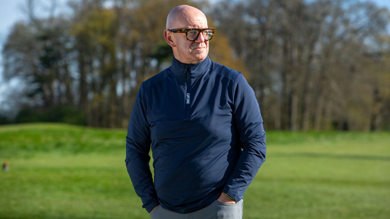 A golfer wears the G/FORE Brushed Back Tech Quarter Zip Pullover