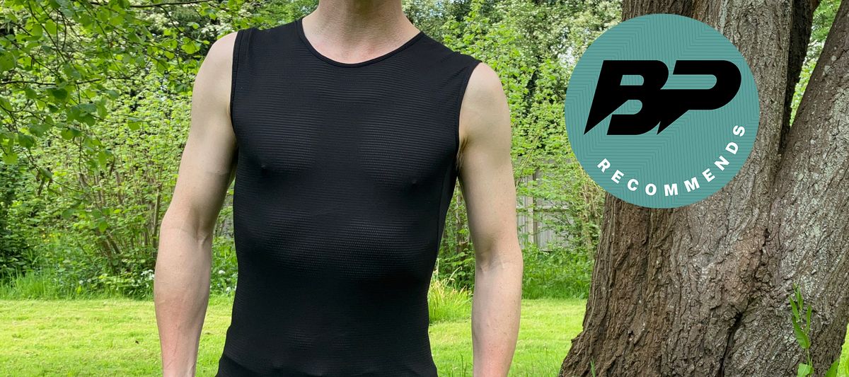 man wearing sleeveless base layer outside