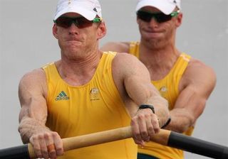 Ginn Drew, pictured at the Beijing Olympic Games with Free Duncan, claimed gold at the Athens games in the Men's Pair rowing event.
