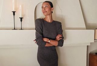 Woman in gray knit dress.