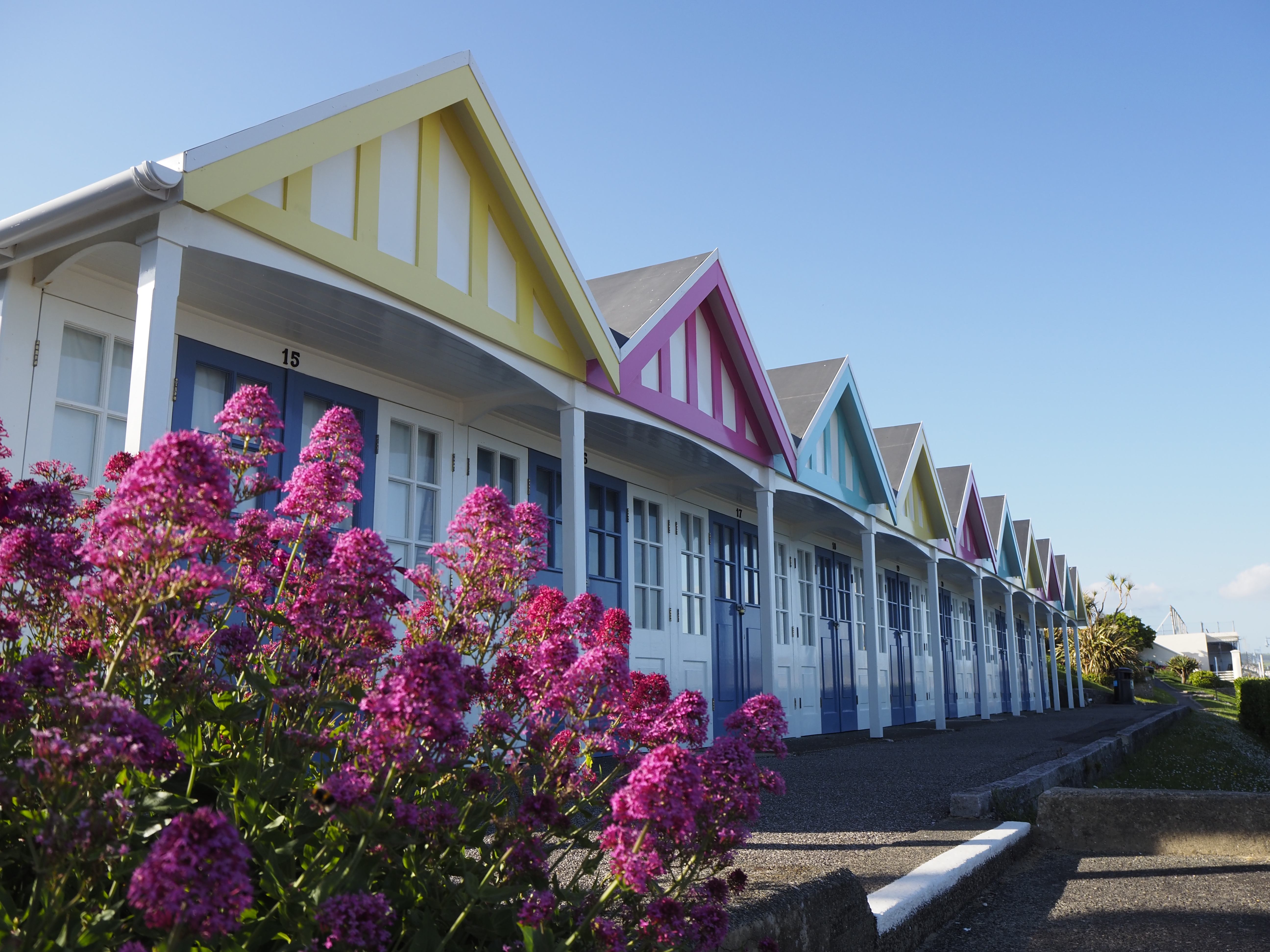 Photo of beach houses shot on the Olympus E-P7