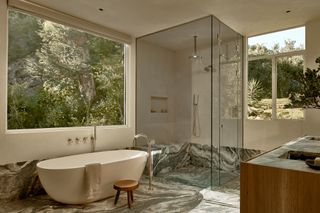 A nature-inspired bathroom with marble pattern floor