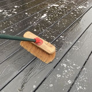 Brush cleaning decking