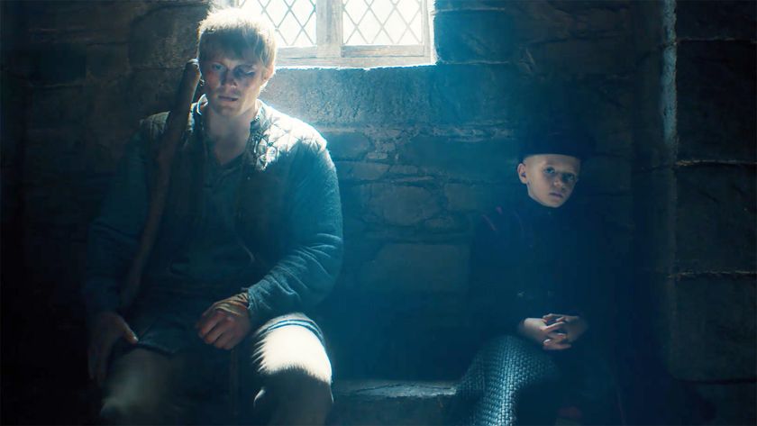 Dunk and Egg sitting on a bench inside a building as light pores in from a window in A Knight of the Seven Kingdoms episode 6