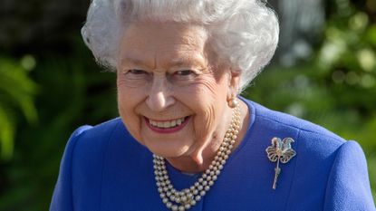 Queen's new family member - Queen Elizabeth II visits the RHS Chelsea Flower Show press day at Royal Hospital Chelsea on May 22, 2017 in London, England