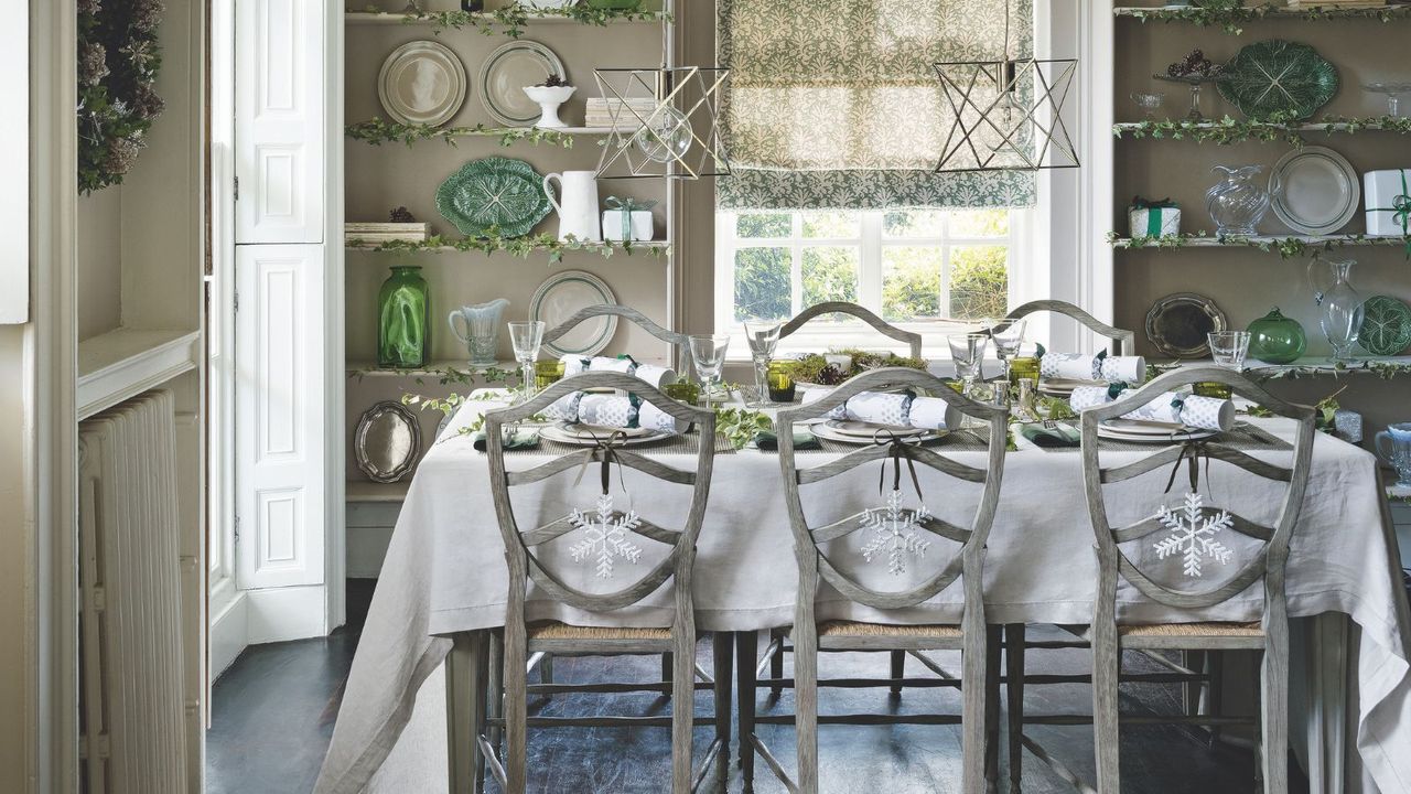 Neutral white and green Christmas table setting 