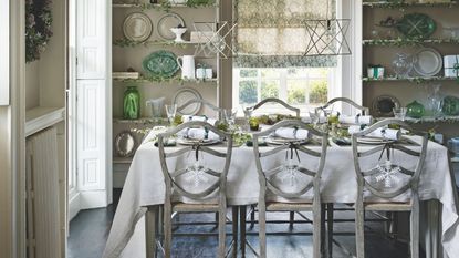 Neutral white and green Christmas table setting