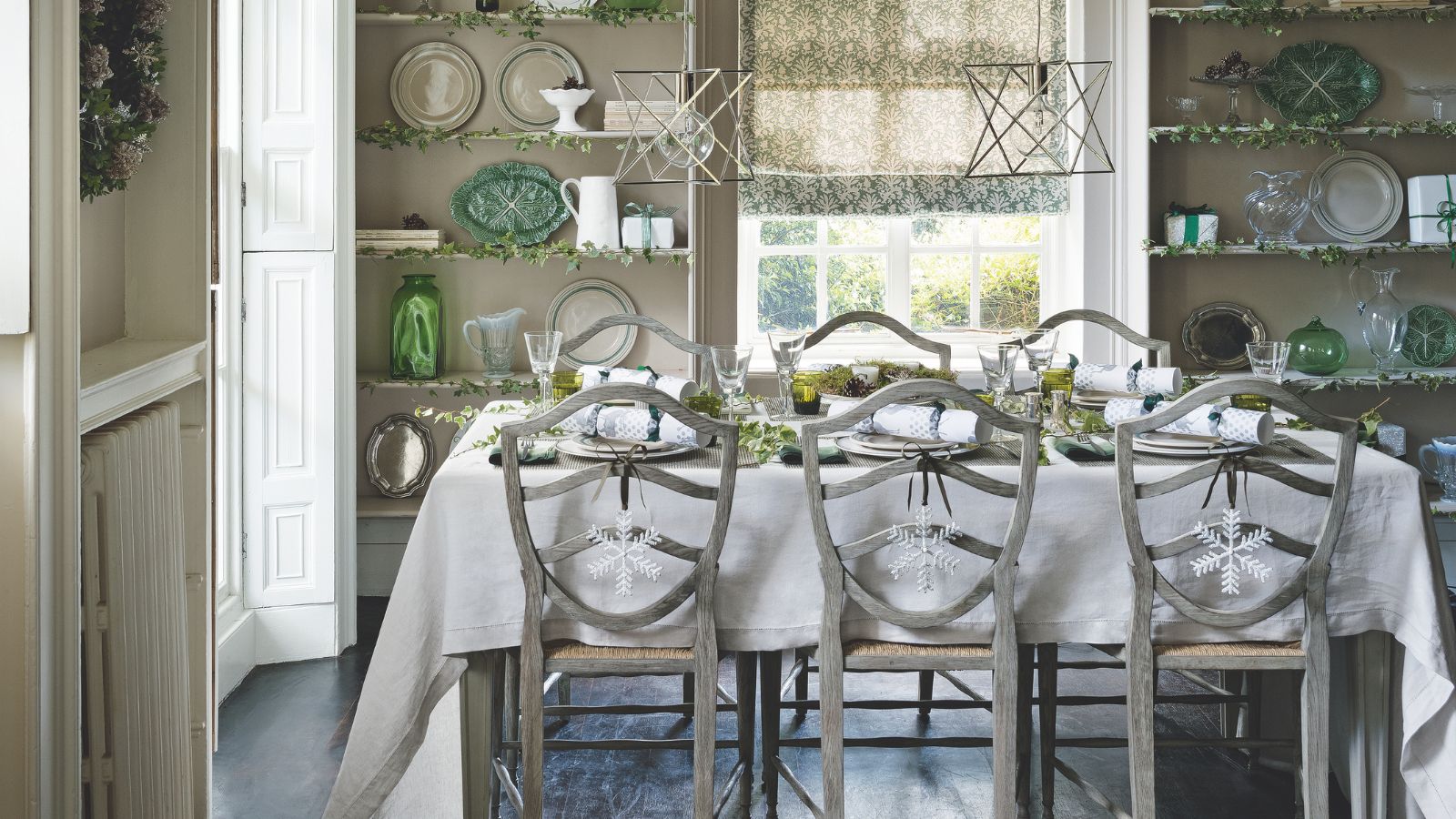 Neutral white and green Christmas table setting 