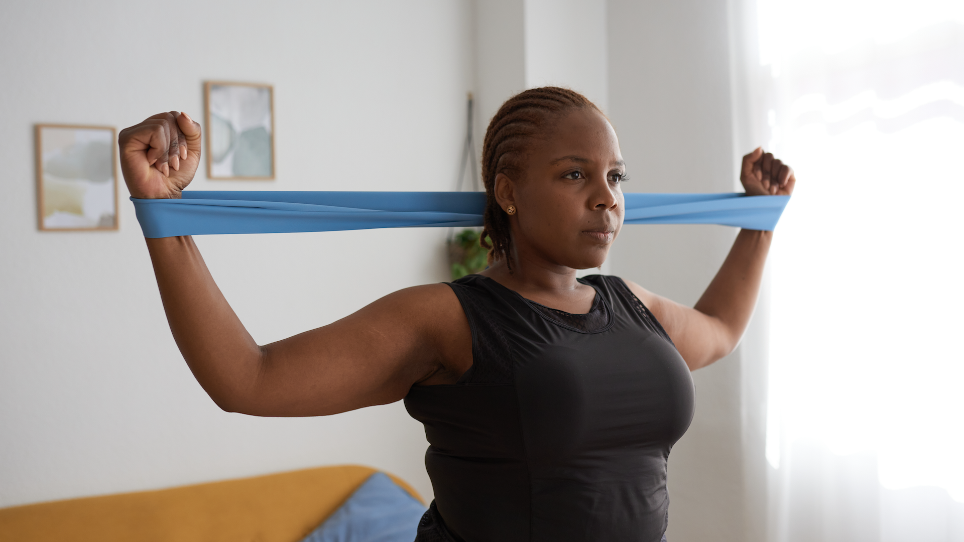 Woman training with a resistance band