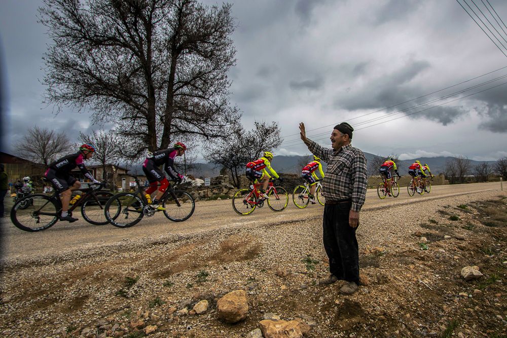 A spectator along the stage 1 route at Tour of Antalya