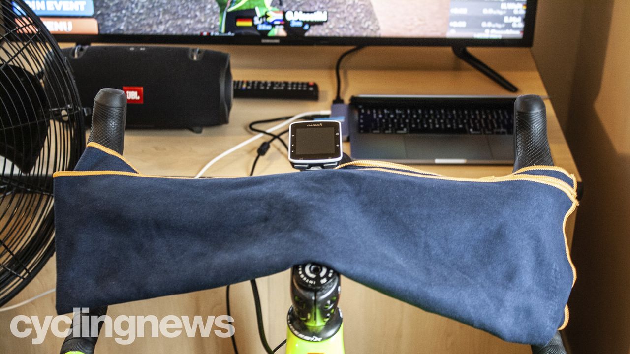Towel protecting an indoor bike