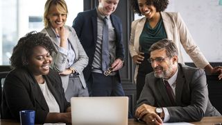 People at the office video conferencing